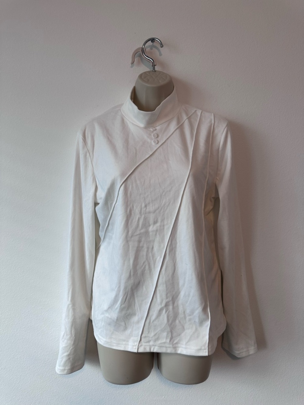 Cream Asymmetrical Button Mock Neck Top